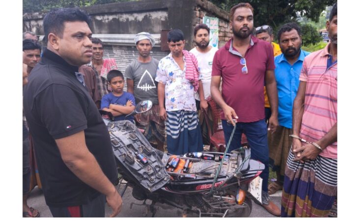 মটরসাইকেলে ফেনসিডিলের থলে থলে সাজানো দৃশ্য